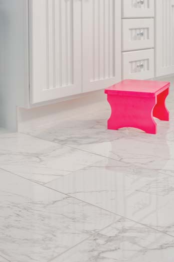 view of floor with a pink stepping stool in light blue bathroom
