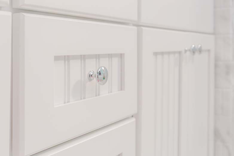 close up of the drawer in light blue bathroom