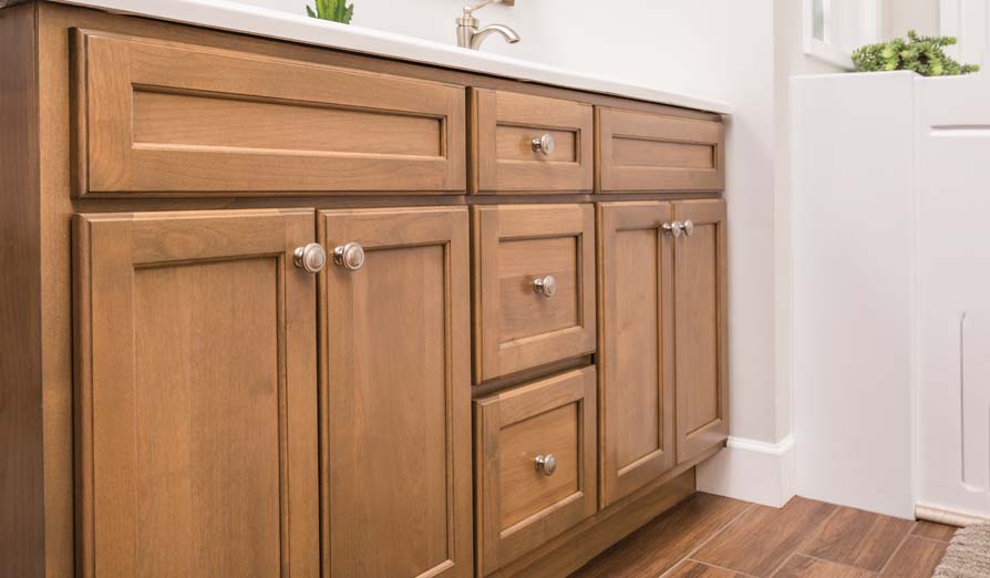 full view of brown sink cabinet