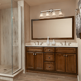 Bathroom Remodel with Dark Wood Vanity by Re-Bath & Kitchens