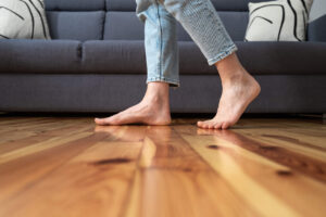 Barefoot person enjoying heated flooring in Phoenix