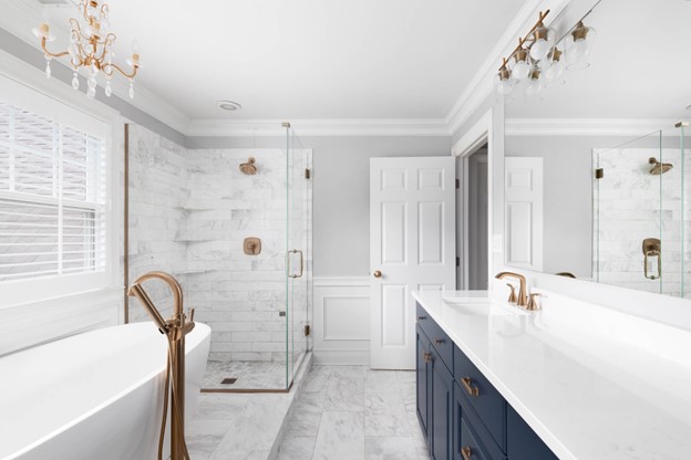 A bathroom with a shower and tub