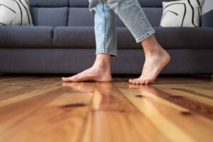 Person  walking on a wood floor in Peoria home
