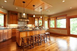 A large wood themed kitchen, created by Re-Bath & Kitchens in Peoria and Scottsdale, AZ.
